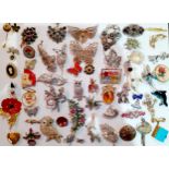 A quantity of vintage brooches, mainly 1950's-1970's examples, to include a micro-mosaic circular