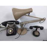 A mid 20th century anglepoise lamp, together with two early/mid 20th century telephones