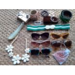 A quantity of 1960's-1980's sunglasses, Retro belts, early 20th Century buckles to include pearlised