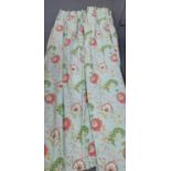 A pair of vibrant floral lined curtains with triple pleat heading, each curtain 96" drop x 66"
