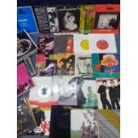 A collection of 45rpm singles to include The Jam, Style Council, Ramones and Siouxsie and the