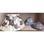 Three Tiffany style decorative glass shades Condition: the larger shade is slightly misshapen -