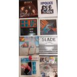 A quantity of soft and heavy rock LP's and single 45rpm records to include The Police, Queen,