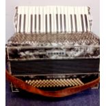 A cased Hohner Verdi II A/F in fitted case. Location:RAM Condition:Some distortion to the centre