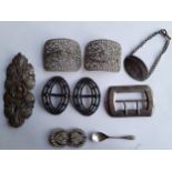 A group of buckles to include an early 20th Century silver William Neadham buckle and other items to