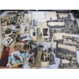 A selection of photographs and ephemera to include some depicting scenes of London, together with