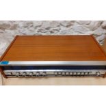 A 1970's teak cased Tandberg FM stereo receiver TR220. Location:G