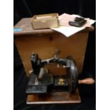 A late Victorian Hopkinson & Bros Lockstitch sewing machine in original oak box with key. Location: