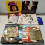 A mixed quantity of records and singles to include ABBA, Rod Stewart, Neil Diamond and others,