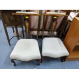 Two Victorian inlaid prayer chairs, pierced centre splats, upholstered arm rests to crest rail,