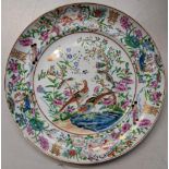 A 19th century Chinese Canton Famille Rose porcelain plate decorated with birds to the centre,