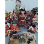 A quantity of mainly 1970's oriental dolls and figural groups Location: 3:1