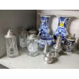 A mixed lot to include a pair of Delft style pottery vases, German pottery and glass steins,