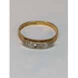 A 18ct gold ring inset with diamonds, total weight 2.0g Location: