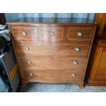 A reproduction Regency inspired chest of three short and three long drawers, on bracket shaped feet,