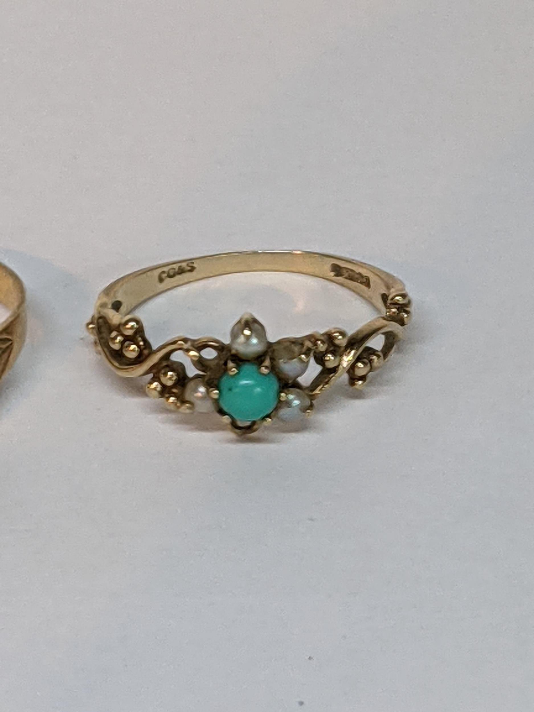A 9ct gold ring inset with an opal surrounded by red ruby's A/F together with a 9ct gold turquoise - Image 2 of 3