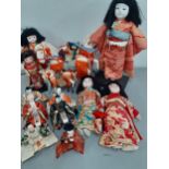 A quantity of mainly 1970's oriental dolls and horses Location: R1:3