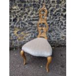 A contemporary giltwood framed chair, upholstered seat in a cream fabric, on cabriole legs Location: