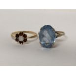 Two 9ct gold rings to include a garnet and opal cluster ring, total weight 6.9g Location: