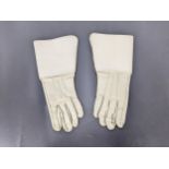 A pair of white leather military gauntlet gloves for bands and parades, drills only, handwritten