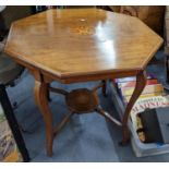 Circa 1900 a mahogany and marquetry inlaid octagonal topped, two tier occasional table Location: RAM