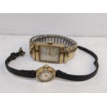 An early/mid 20th century 9ct Record gents watch on a later expanding bracelet, together with a