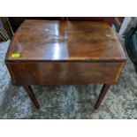 A late Victorian/Edwardian walnut Pembroke table of small proportions, quarter cut and inlaid string