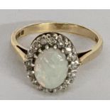 A 9ct gold diamond ring, total weight 3.4g Location: