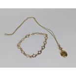 A 9ct gold necklace with a locket together with a 9ct gold bracelet, total weight 5.3g Location: