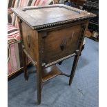 A 1920's oak hinged top sewing cabinet with shelf below, 81cm h x 47.5cm w Location: