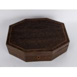 An early 19th century Partridge wood octagonal jewellery box, the hinged lid with a king wood