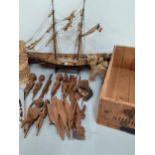 A treen model of a galleon together with African tribal items, a vintage wooden crate and other