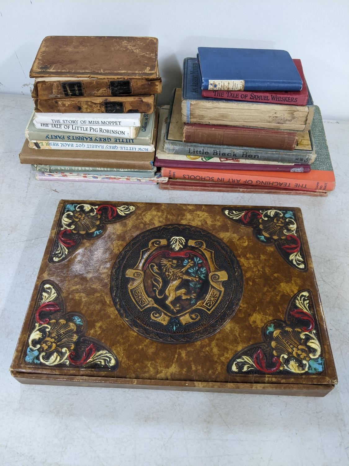 An early 20th century empty Chocolat Tobler Florence chocolate box, together with mixed books to