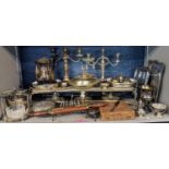 A mixed lot of silver plate and metalware to include a plate warmer, teapots, condiments, dishes,