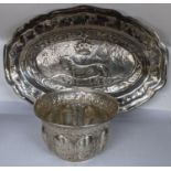 A continental white metal embossed bowl, 83.5g, together with a silver plated tray decorated with