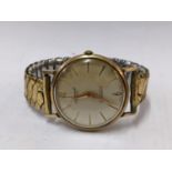 A vintage Accurist 9ct gold gents wristwatch on a later expanding bracelet Location: