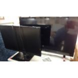 Two small televisions comprising a Sharp Aquos 32" television on stand and a smaller Samsung 23"