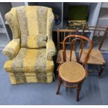 A modern wing back armchair, together two rush seated country chairs and a bentwood chair Location: