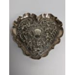 A silver cherub decorated pin dish, 50.1g Location: TABLE
