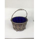 An early 20th century silver basket having a floral pierced design by Mappin & Webb, hallmarked