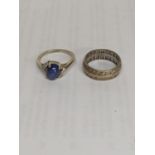 A ring stamped with 10k set with a blue stone and diamonds together with a 9ct ring set with white