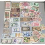 A mixed quantity of early 20th century and later world banknotes to include a 1943 Croatian 5000