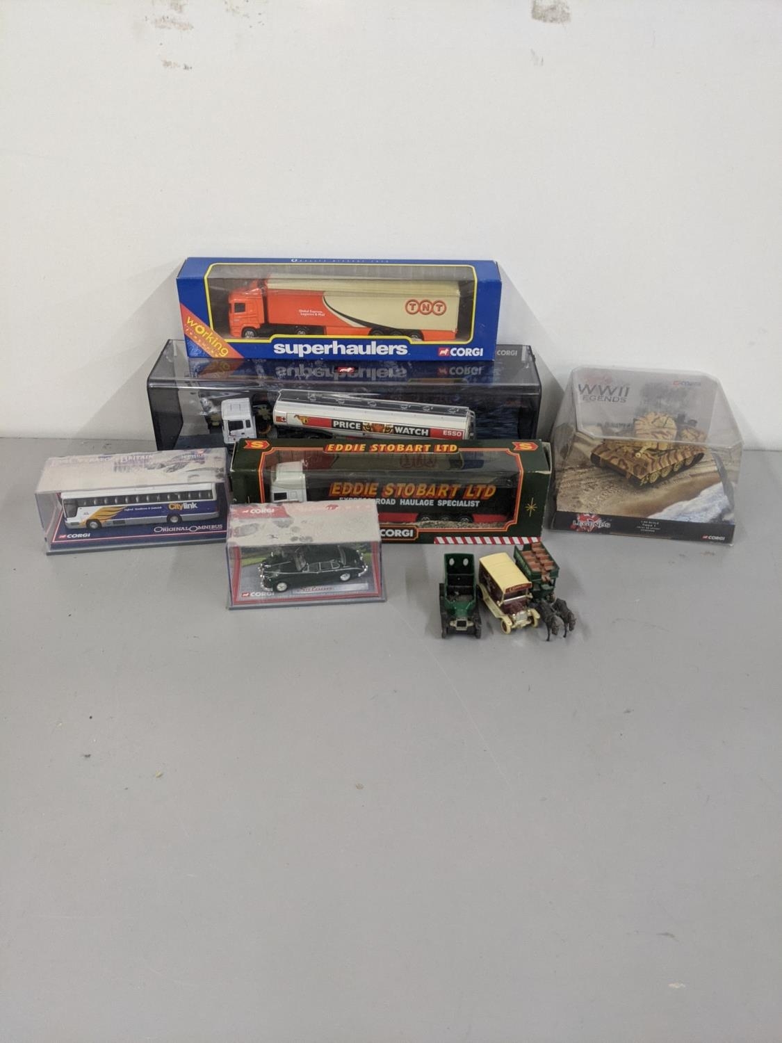 A collection of Corgi boxed models to include Corgi modern trucks, Corgi 1:50 scale Tiger 1 101st