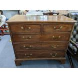 A George III mahogany chest of two short and three long drawers on bracket feet, 89.5h x 100.5w,