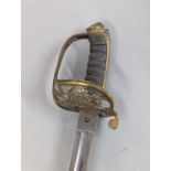 A Victorian 1854 pattern Infantry Officers sword, stamped 1834 to blade spine and having Queen