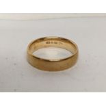 A 9ct gold wedding band, 3.6g Location: