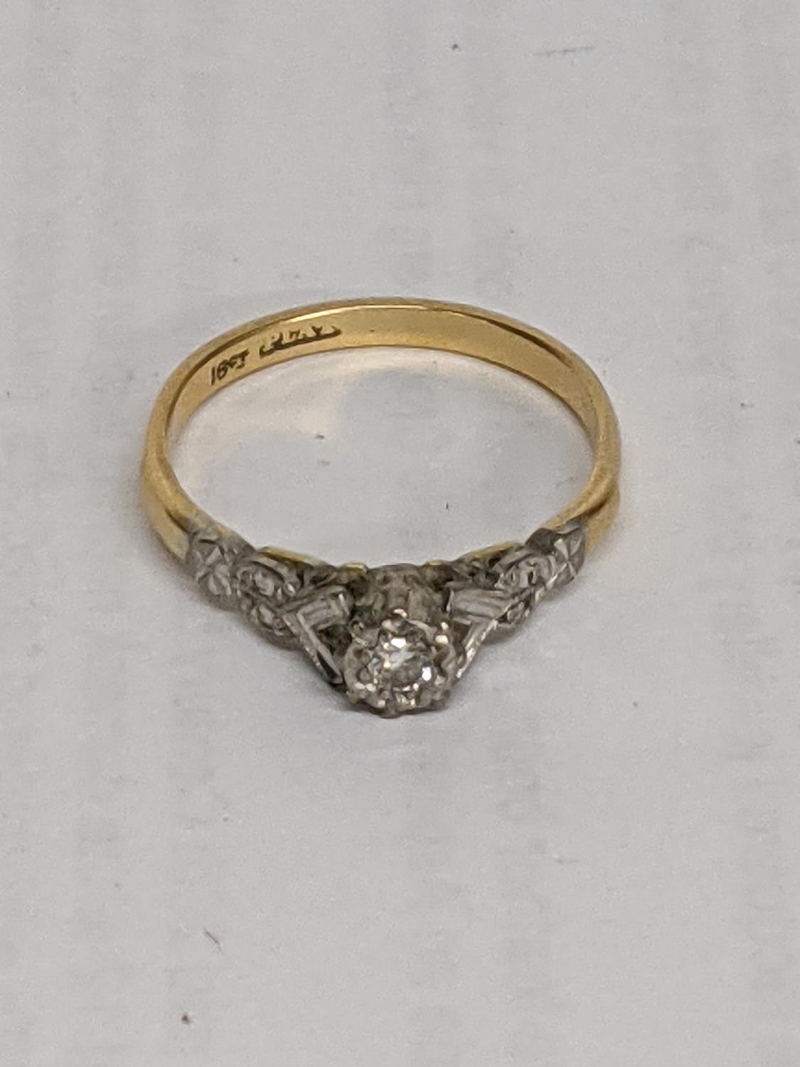 Two 18ct gold rings, one set with a diamond, total weight 5.8g Location: - Image 2 of 3