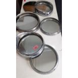 Five vintage chrome headlight frames with inset mirrors Location: RAB