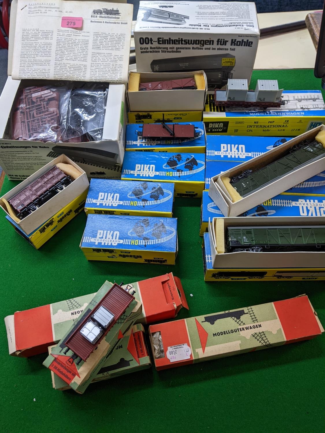 A group of pre 1980s German H0 (00) gauge model railway carriages and rolling stock to include