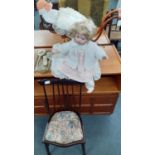 A reproduction dolls pram, a 1999 Cititoy doll and one other and a vintage dressing table set A/F,